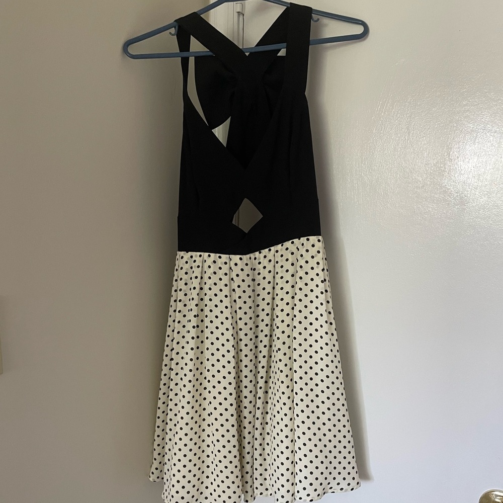 Classic mini dress with Polk a dots and giant BOW on the back